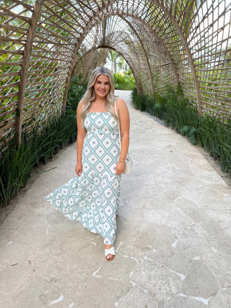 Lauren Erro in a geometric print maxi dress