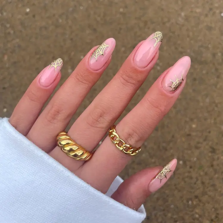 Gold spider web nails