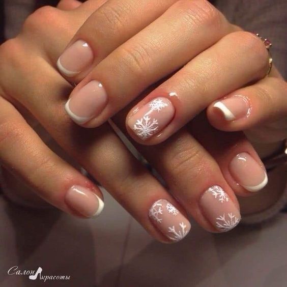 Short holiday nail ideas french tip and snowflakes